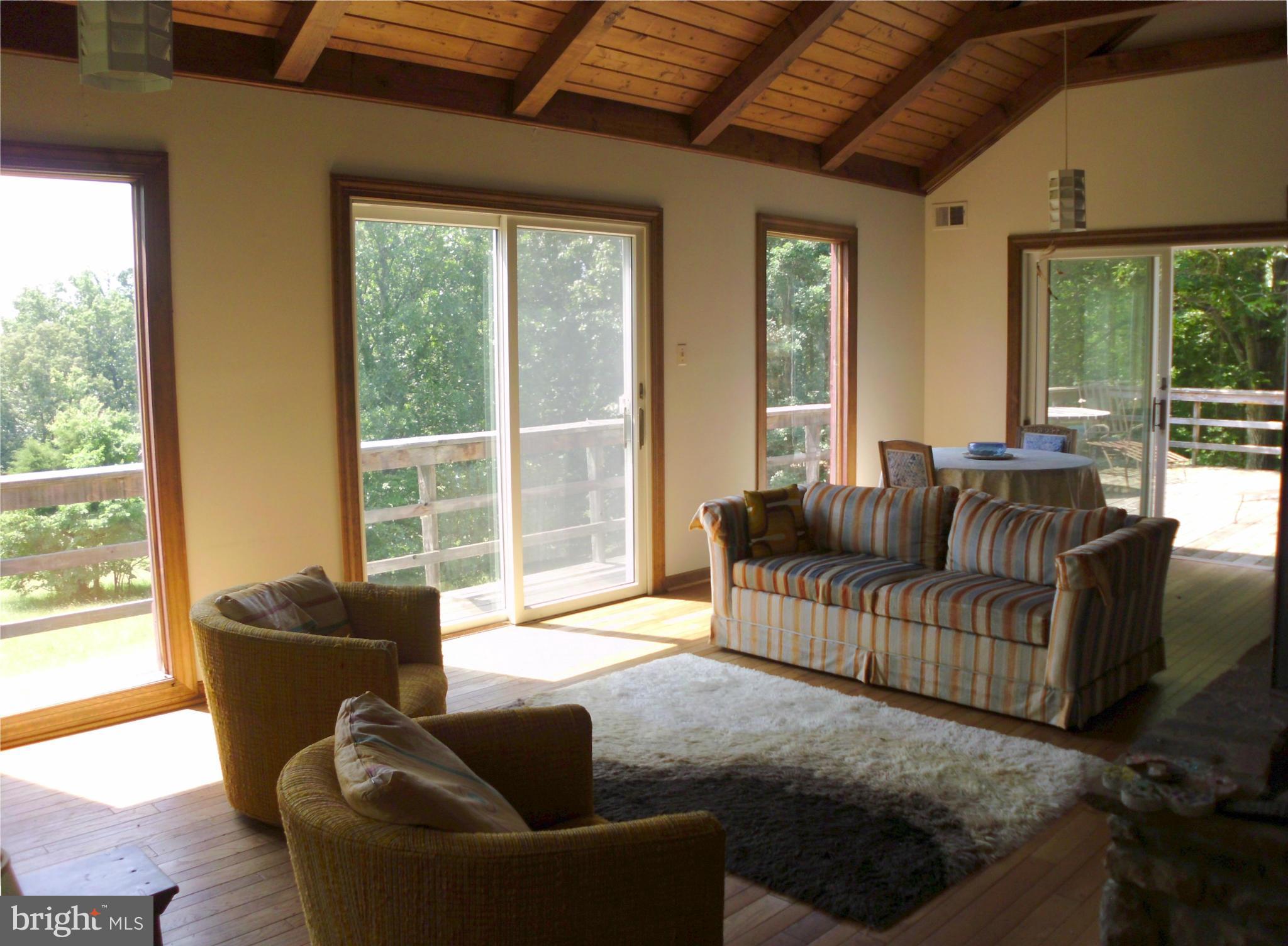 6594 Swains Road Marshall, VA 20115 - Photo 4 of 28 a living room with furniture and a large window
