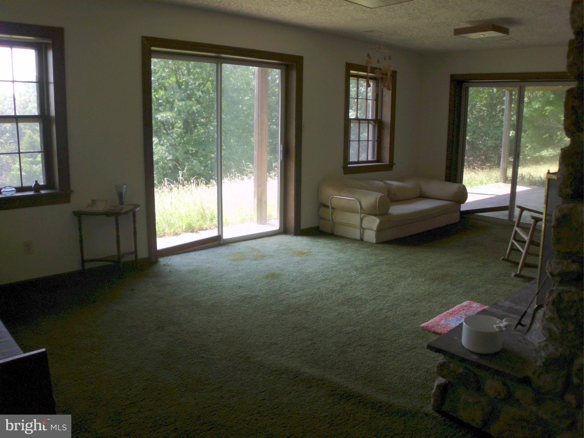 6594 Swains Road Marshall, VA 20115 - Photo 8 of 28 a living room with furniture and a window