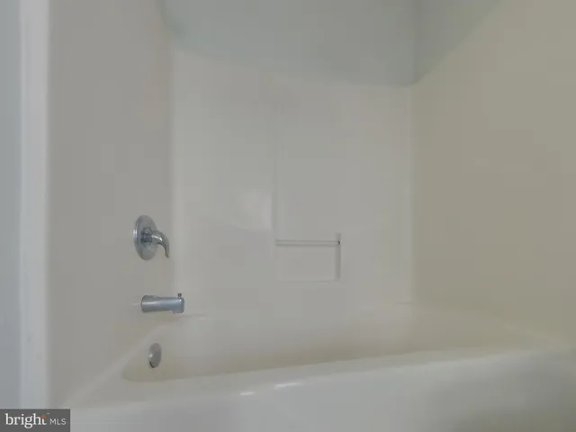 a close up of a bathtub