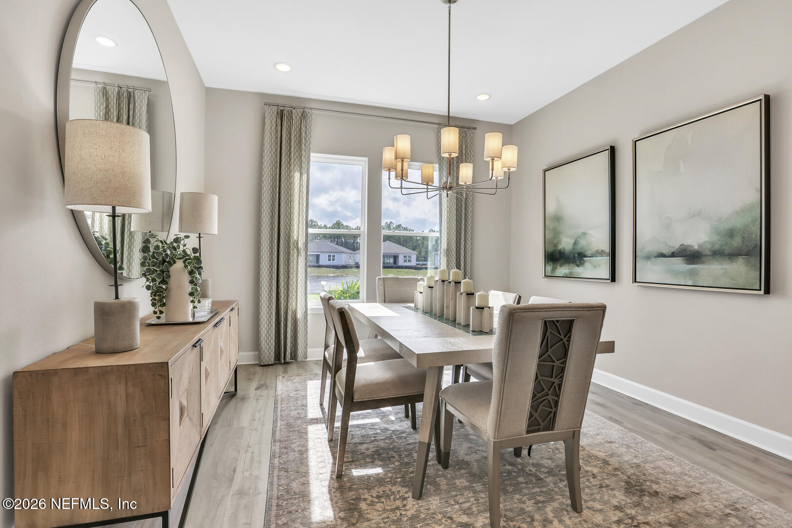 44 Ribera Drive Flagler Beach, FL 32136 - Photo 16 of 26 a view of a dining room with furniture window and wooden floor