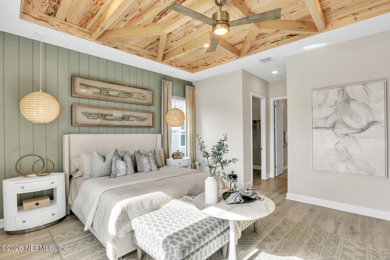 44 Ribera Drive Flagler Beach, FL 32136 - Photo 21 of 26 a bedroom with a bed and wooden floor