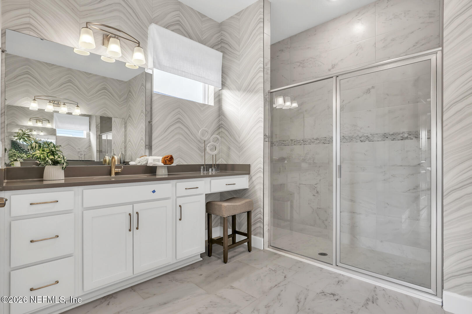 44 Ribera Drive Flagler Beach, FL 32136 - Photo 24 of 26 a bathroom with a granite countertop sink a mirror and a shower