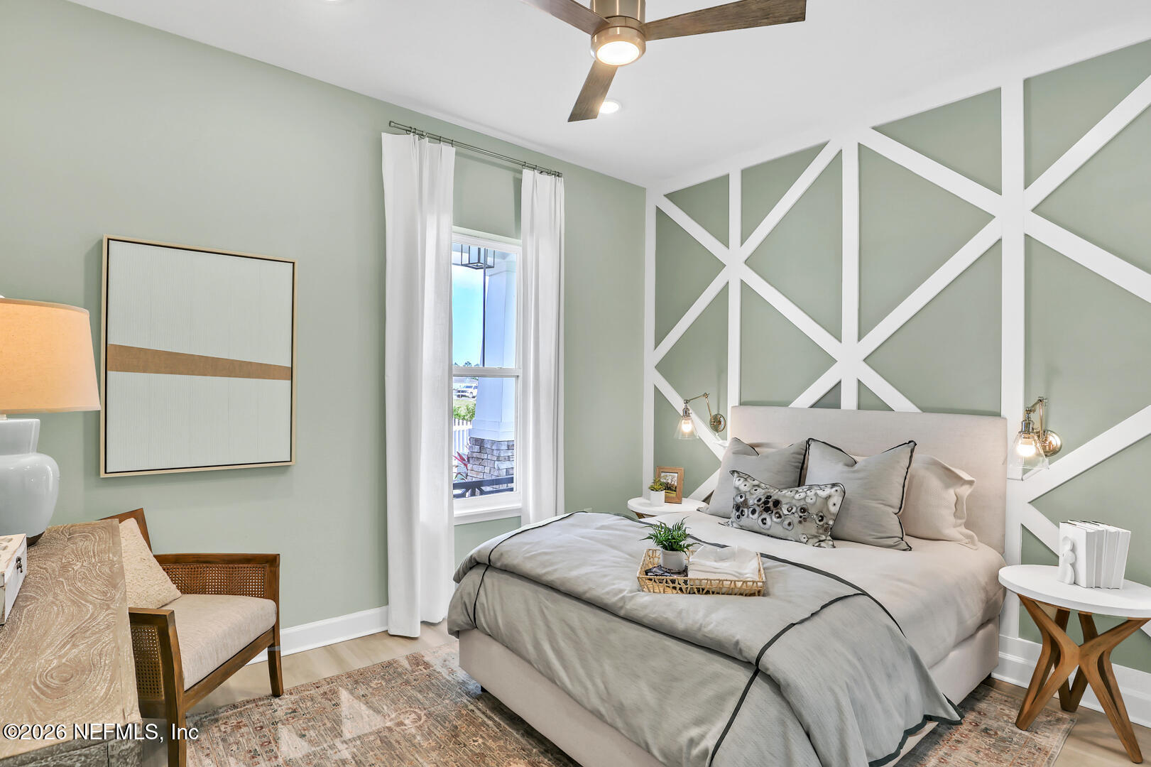 44 Ribera Drive Flagler Beach, FL 32136 - Photo 3 of 26 a bedroom with a bed and a chair