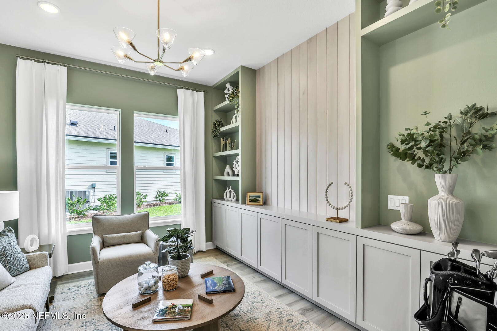 44 Ribera Drive Flagler Beach, FL 32136 - Photo 5 of 26 a living room with furniture and a large window