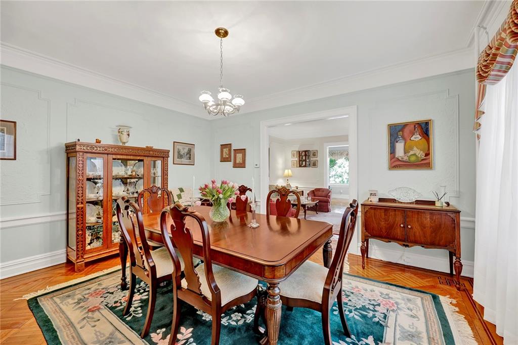 7607 Colonial Road Brooklyn, NY 11209 - Photo 10 of 35 a view of a dining room with furniture and wooden floor