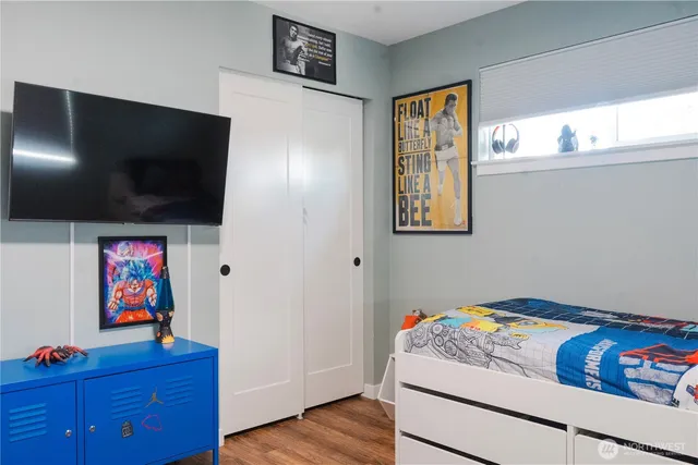 a living room with furniture and flat screen tv
