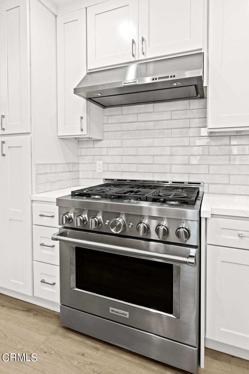 619 Corwin Avenue Glendale, CA 91206 - Photo 21 of 44 a stove top oven sitting inside of a kitchen