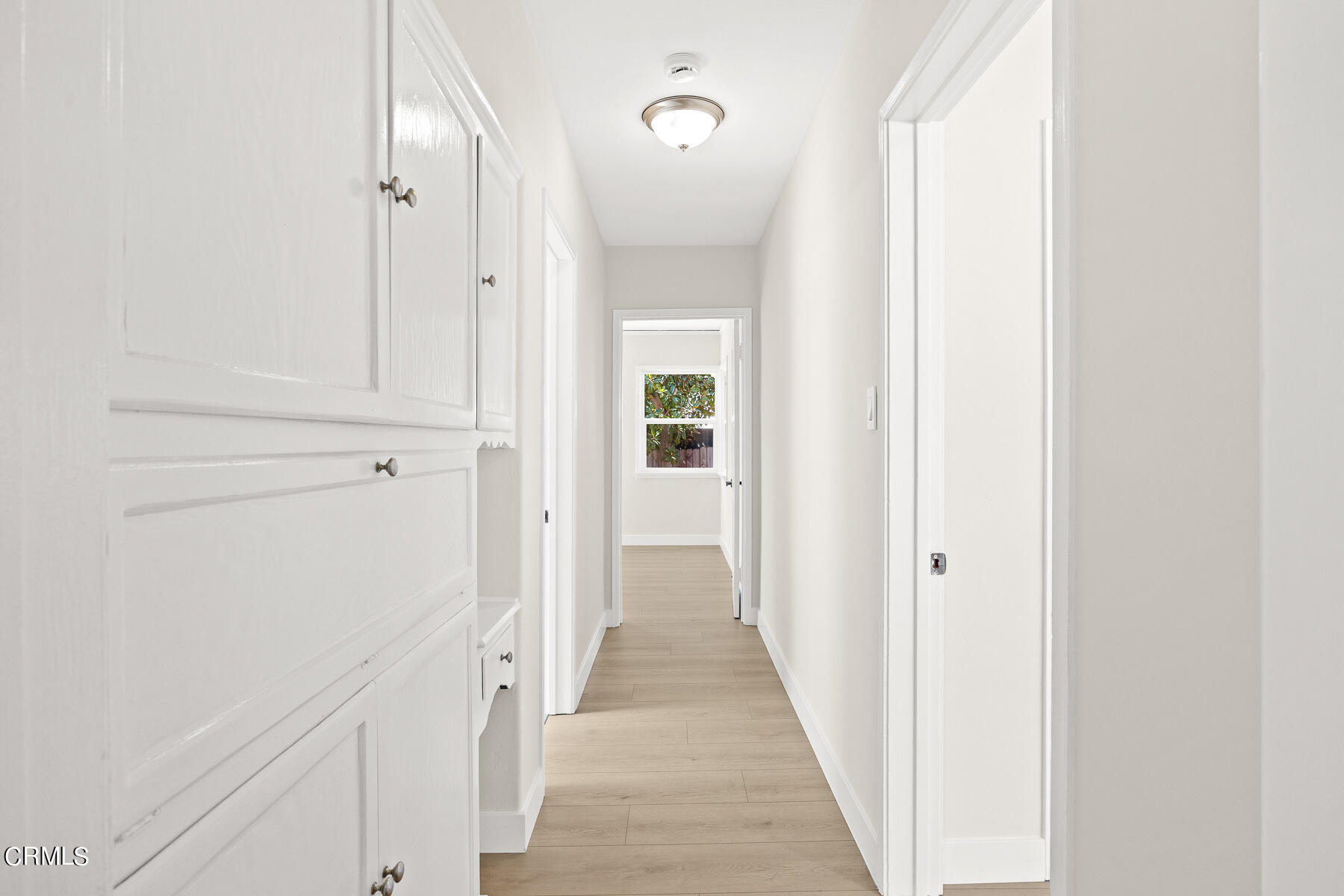 619 Corwin Avenue Glendale, CA 91206 - Photo 25 of 44 a view of a hallway with wooden floor