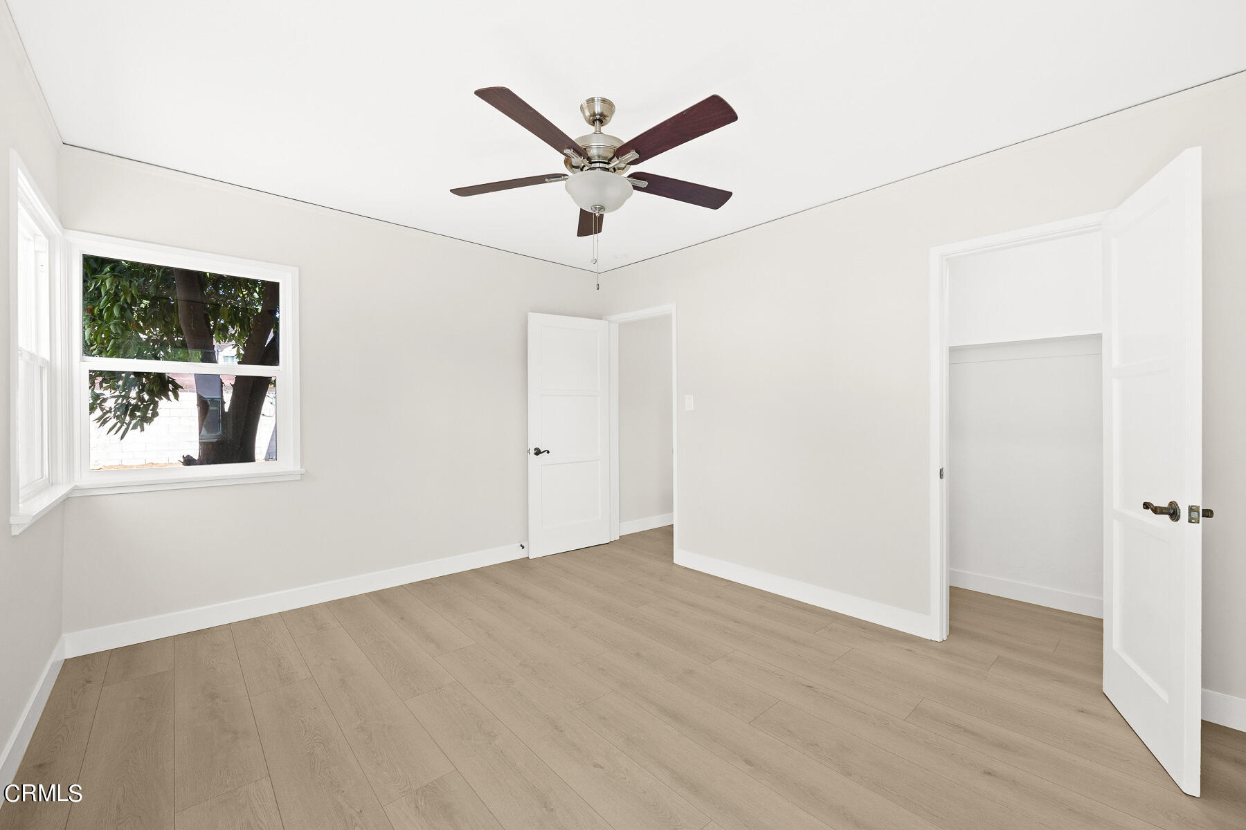 619 Corwin Avenue Glendale, CA 91206 - Photo 31 of 44 a view of a ceiling fan with wooden floor