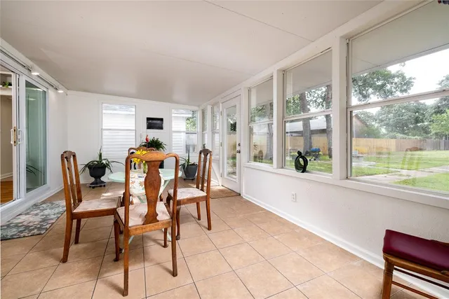 a view of a storage & utility room with two washing machine