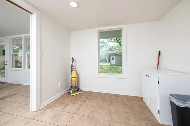 a bathroom with a sink mirror and vanity