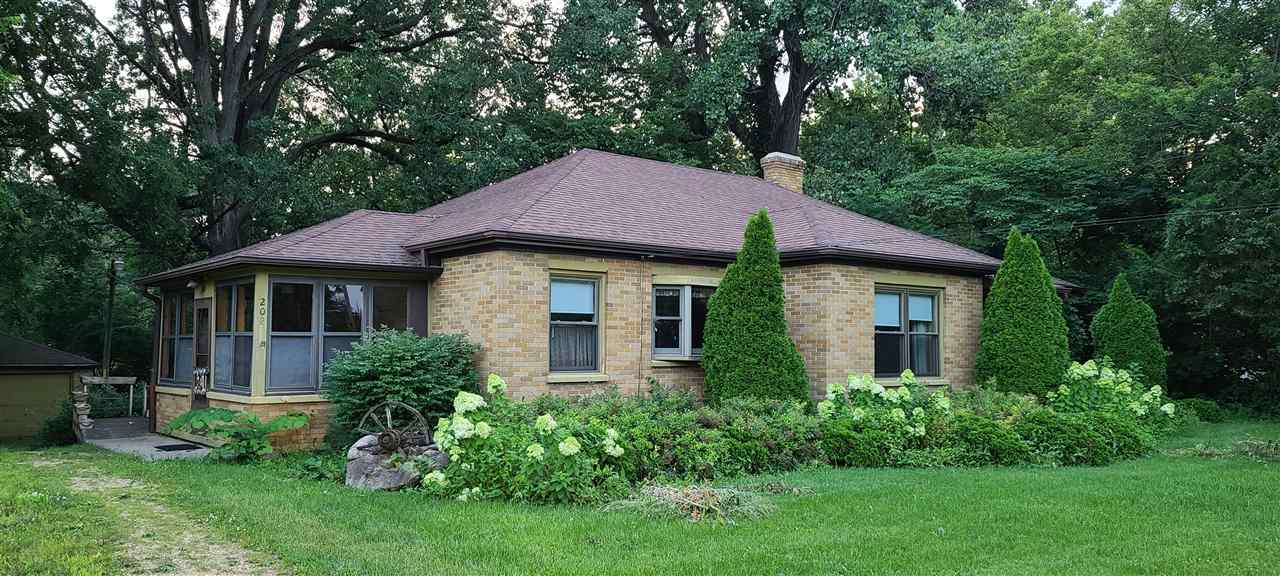 202 South Main Street Rochelle, IL 61068 - Photo 1 of 35 a front view of a house with a yard