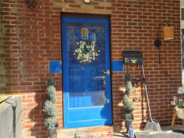 a front view of a house with a door