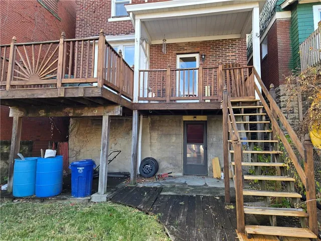 a front view of a house with parking