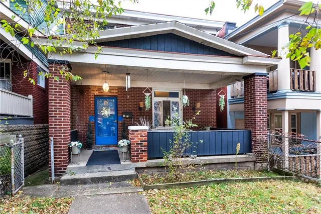 a view of a house with fountain bath tub and chairs