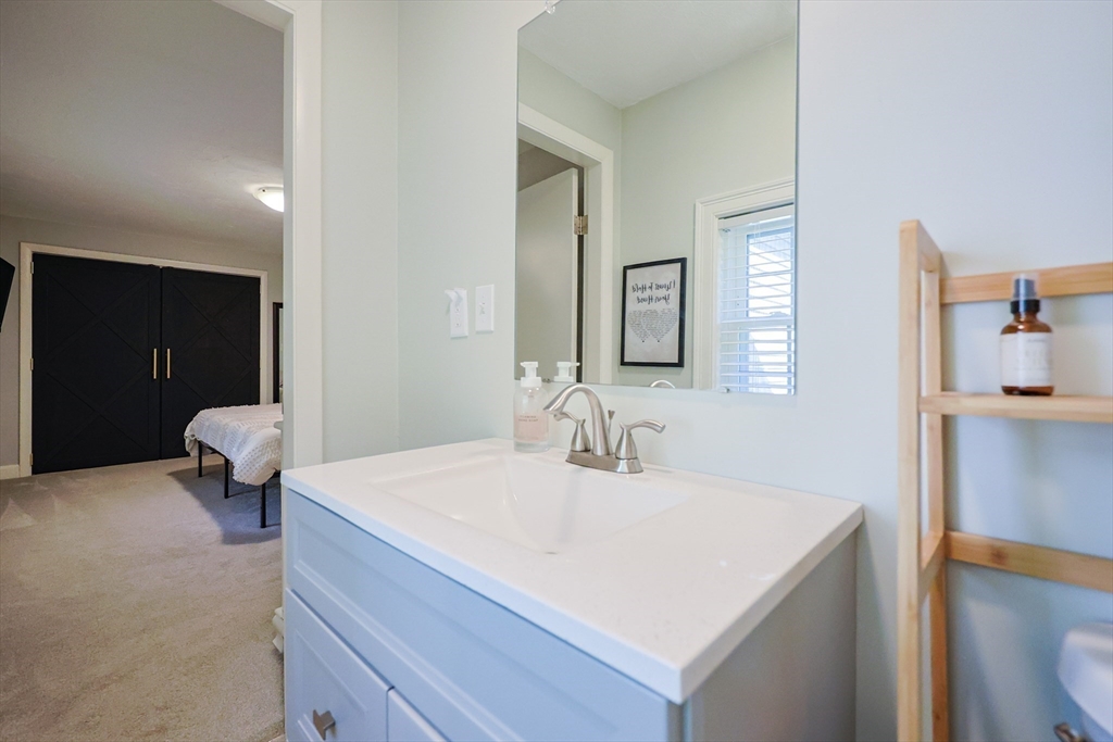 123 Harris Road Ashburnham, MA 01430 - Photo 14 of 32 a bathroom with a sink toilet and mirror