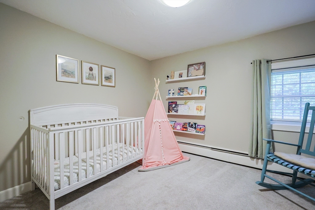 123 Harris Road Ashburnham, MA 01430 - Photo 16 of 32 a bedroom with furniture and a window