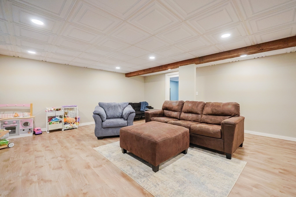 123 Harris Road Ashburnham, MA 01430 - Photo 19 of 32 a living room with furniture and a couch
