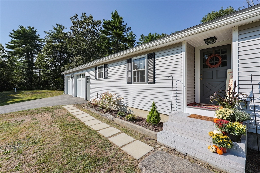 123 Harris Road Ashburnham, MA 01430 - Photo 2 of 32 a house view with a outdoor space