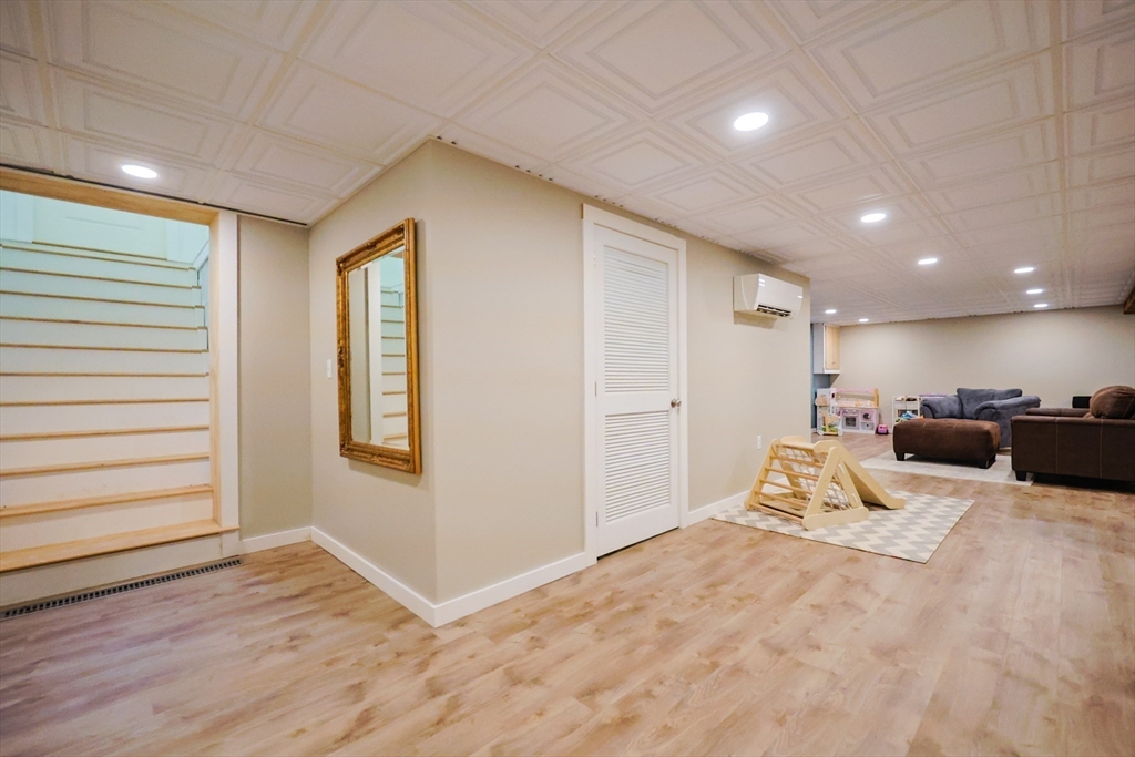 123 Harris Road Ashburnham, MA 01430 - Photo 22 of 32 a view of a livingroom with a staircase