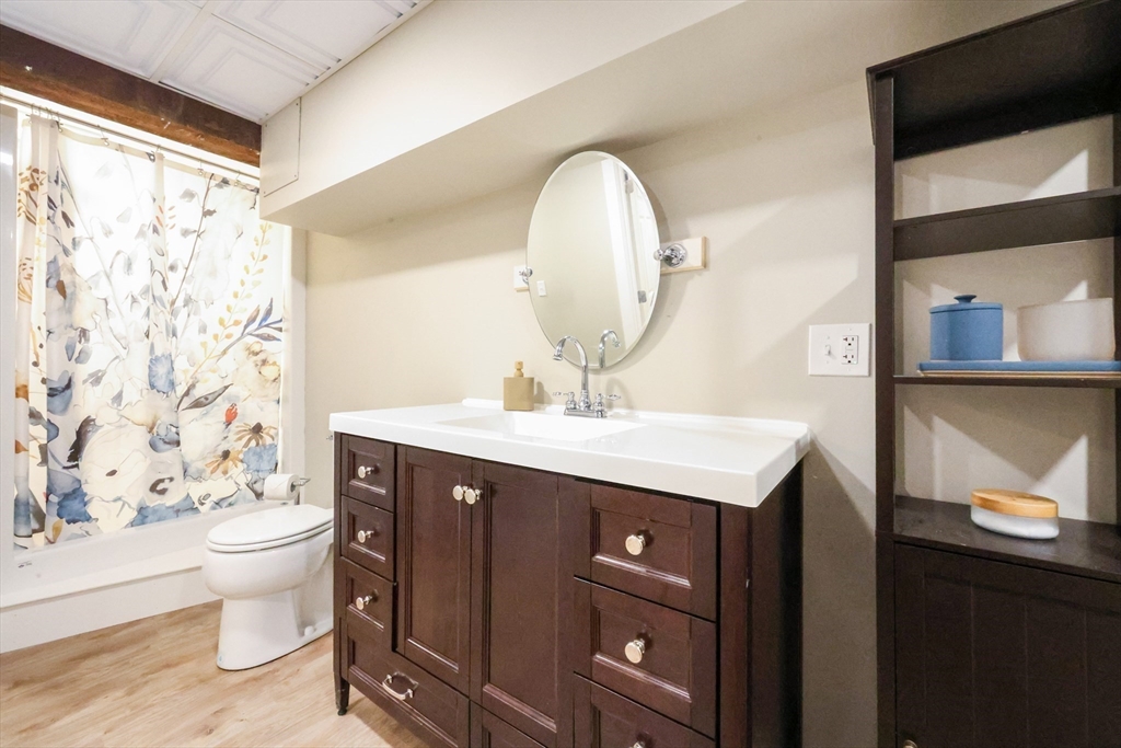 123 Harris Road Ashburnham, MA 01430 - Photo 23 of 32 a bathroom with a sink toilet and a mirror