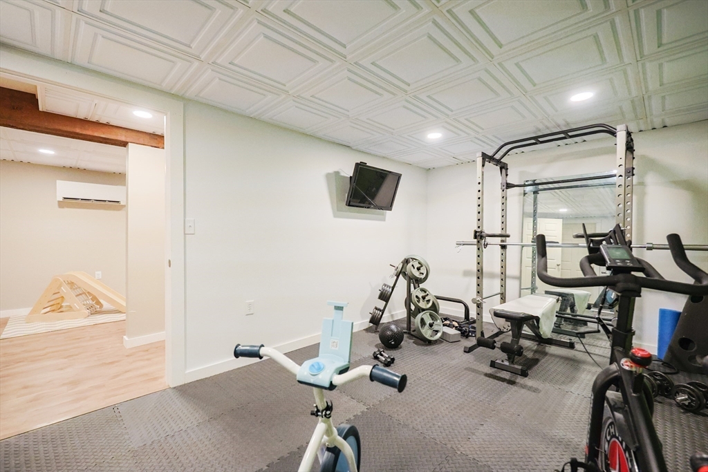 123 Harris Road Ashburnham, MA 01430 - Photo 26 of 32 a view of a room with gym equipment