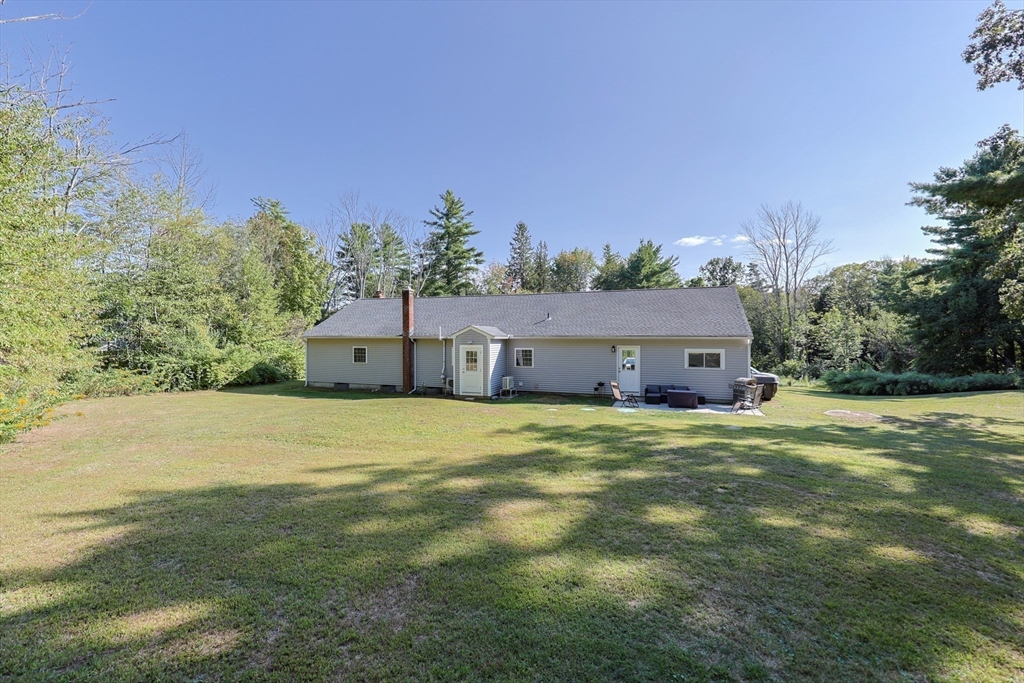 123 Harris Road Ashburnham, MA 01430 - Photo 30 of 32 a house with a field