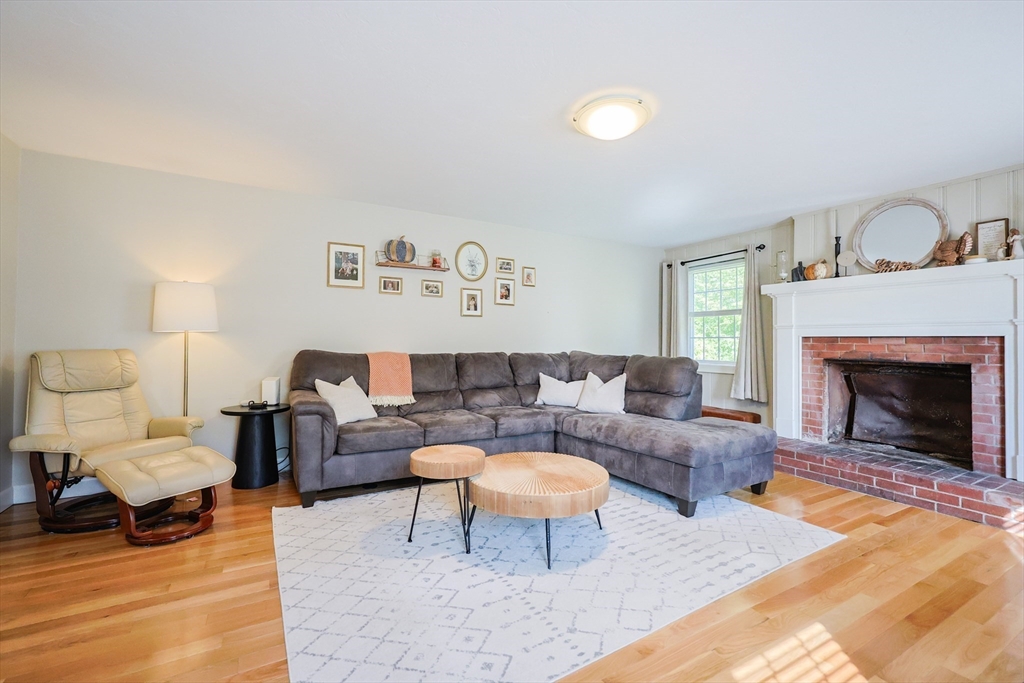 123 Harris Road Ashburnham, MA 01430 - Photo 4 of 32 a living room with furniture and a fireplace