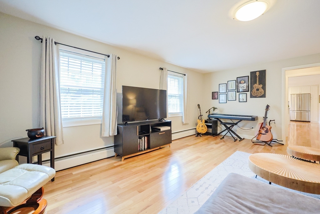 123 Harris Road Ashburnham, MA 01430 - Photo 5 of 32 a living room with furniture and a flat screen tv
