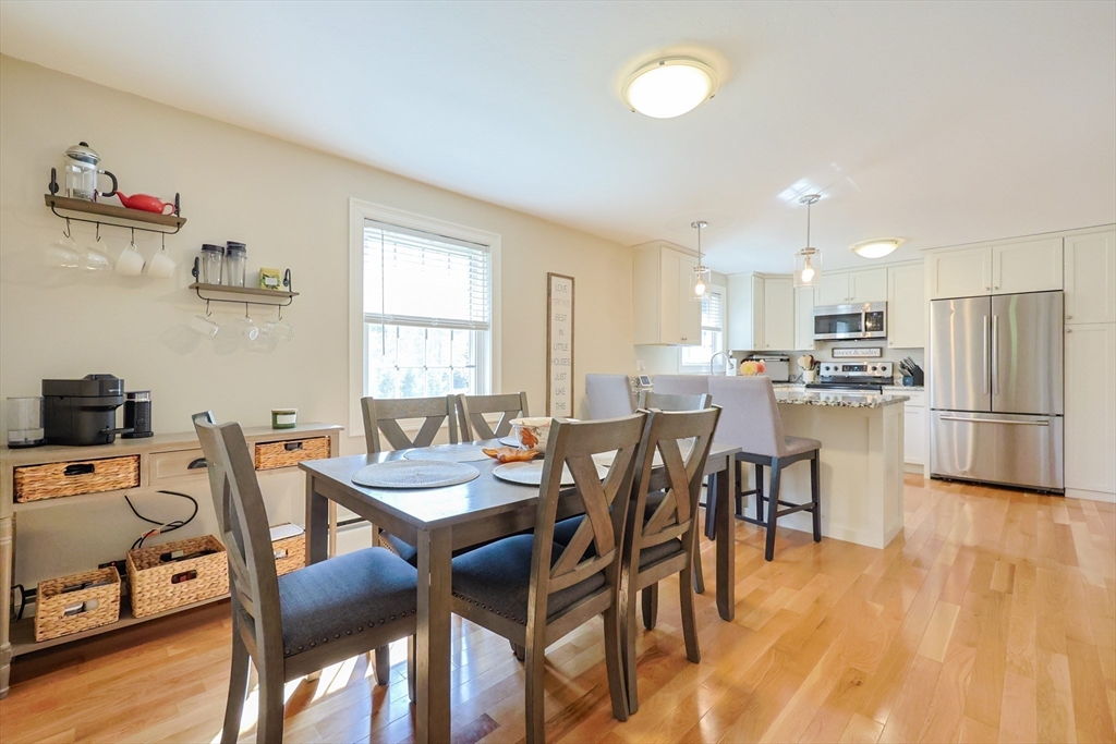123 Harris Road Ashburnham, MA 01430 - Photo 7 of 32 a view of a dining room with furniture and wooden floor