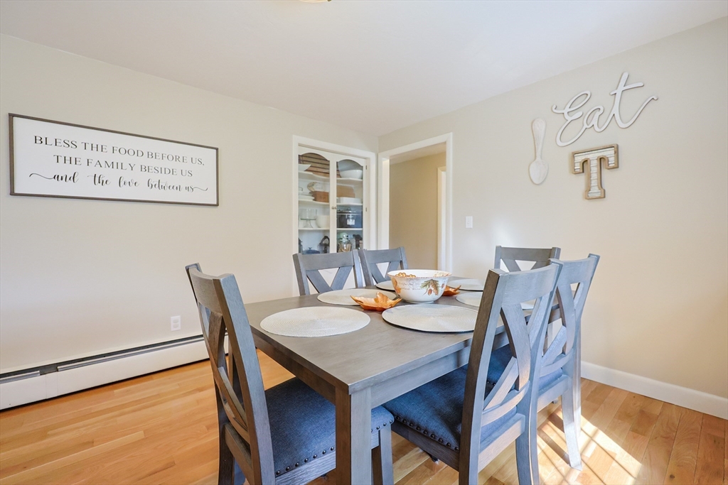 123 Harris Road Ashburnham, MA 01430 - Photo 8 of 32 a view of a dining room with furniture and wooden floor