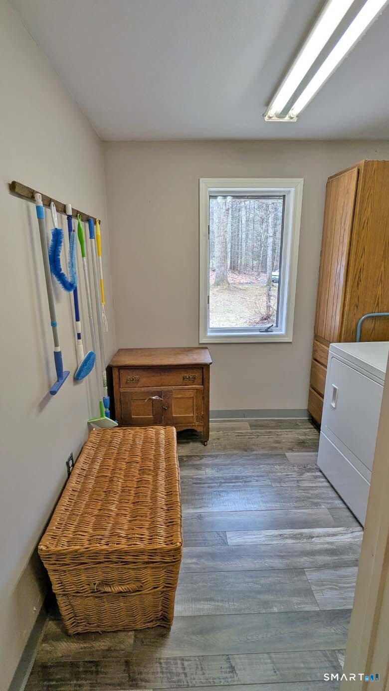 123 Old North Road Winchester, CT 06098 - Photo 24 of 28 Cabinets and room to set up an ironing board if you use one.