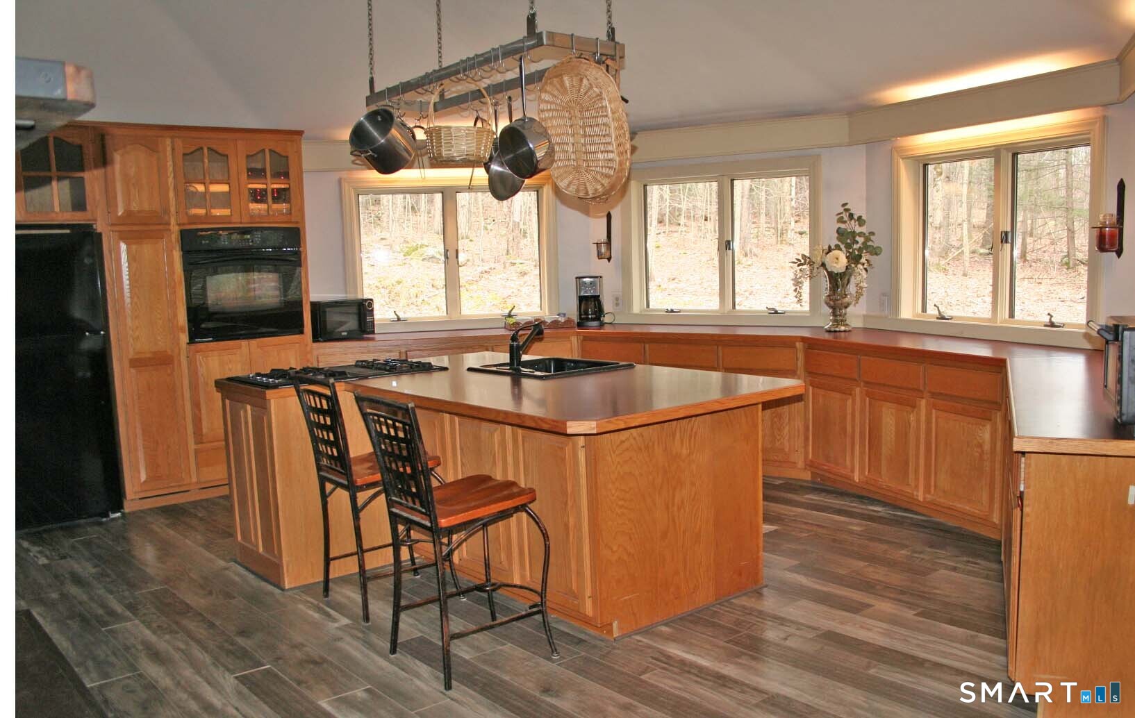 123 Old North Road Winchester, CT 06098 - Photo 8 of 28 Kitchen has a huge bay with cabinets and counters under the windows.
