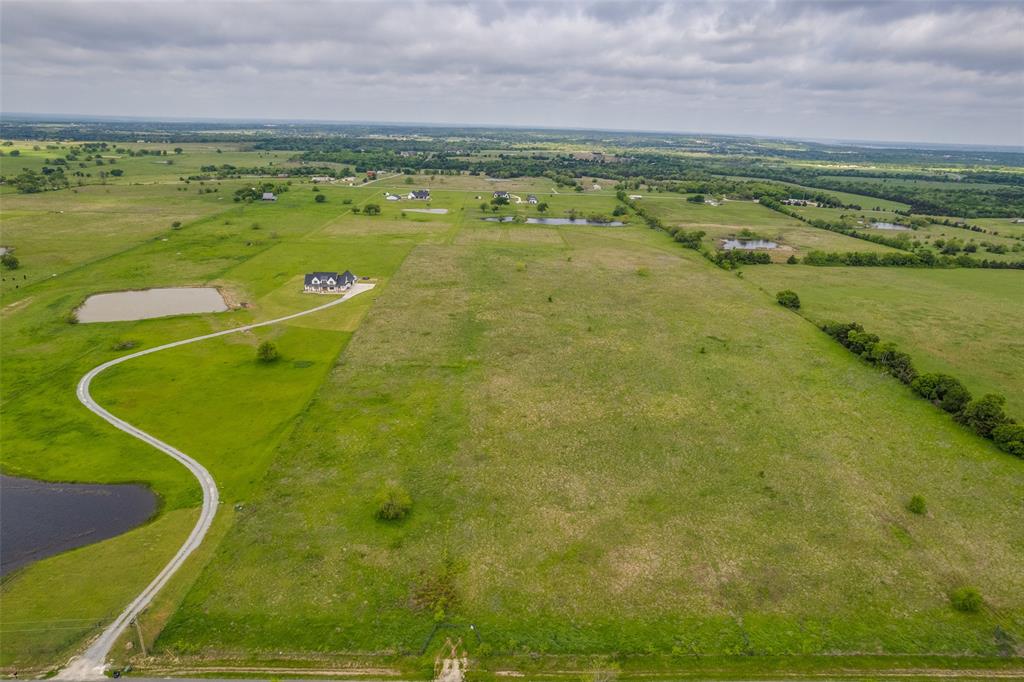 6593 Preston Road Denison, TX 75020 - Photo 2 of 7 a view of a swimming pool