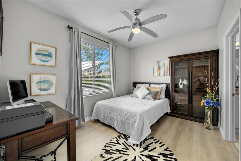 5565 Ocean, Unit 103 Hawthorne, CA 90250 - Photo 22 of 56 a bedroom with a bed and a window