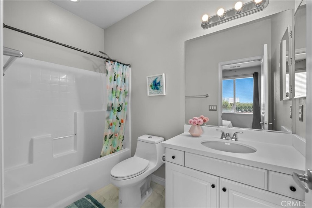 5565 Ocean, Unit 103 Hawthorne, CA 90250 - Photo 39 of 56 a bathroom with a sink toilet and shower