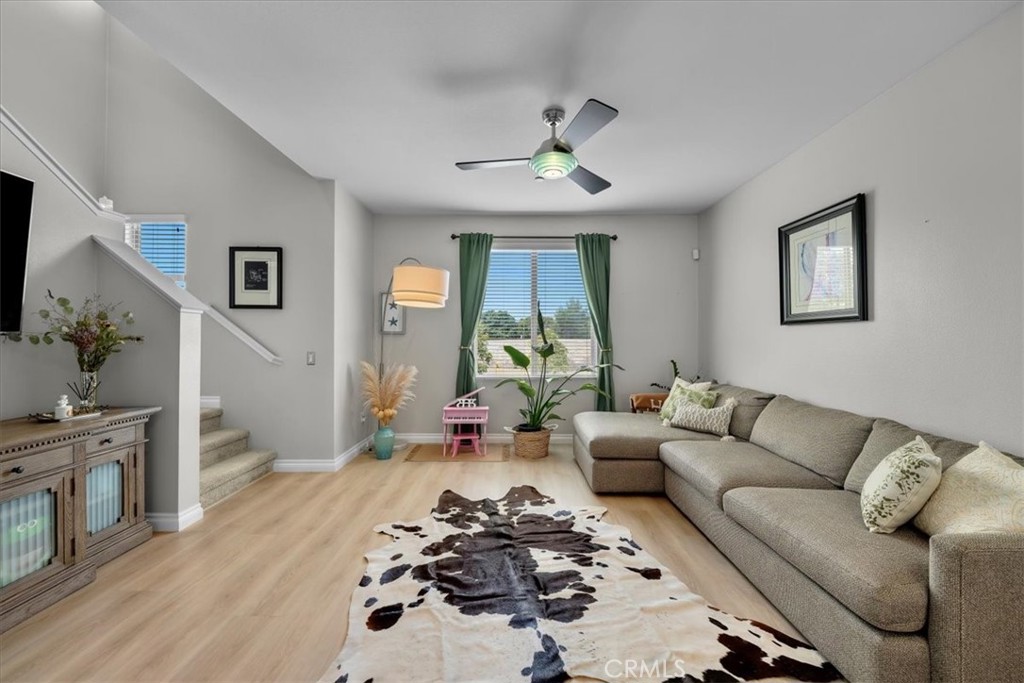 5565 Ocean, Unit 103 Hawthorne, CA 90250 - Photo 6 of 56 a living room with furniture and a flat screen tv
