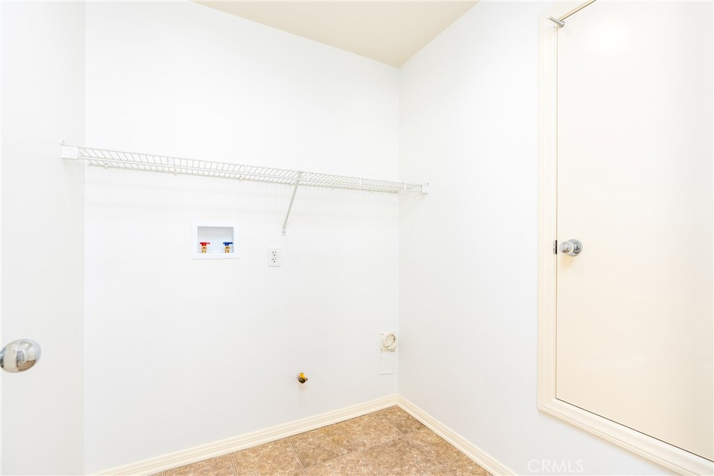 63 Nightshade Irvine, CA 92603 - Photo 13 of 15 a view of small space with empty racks