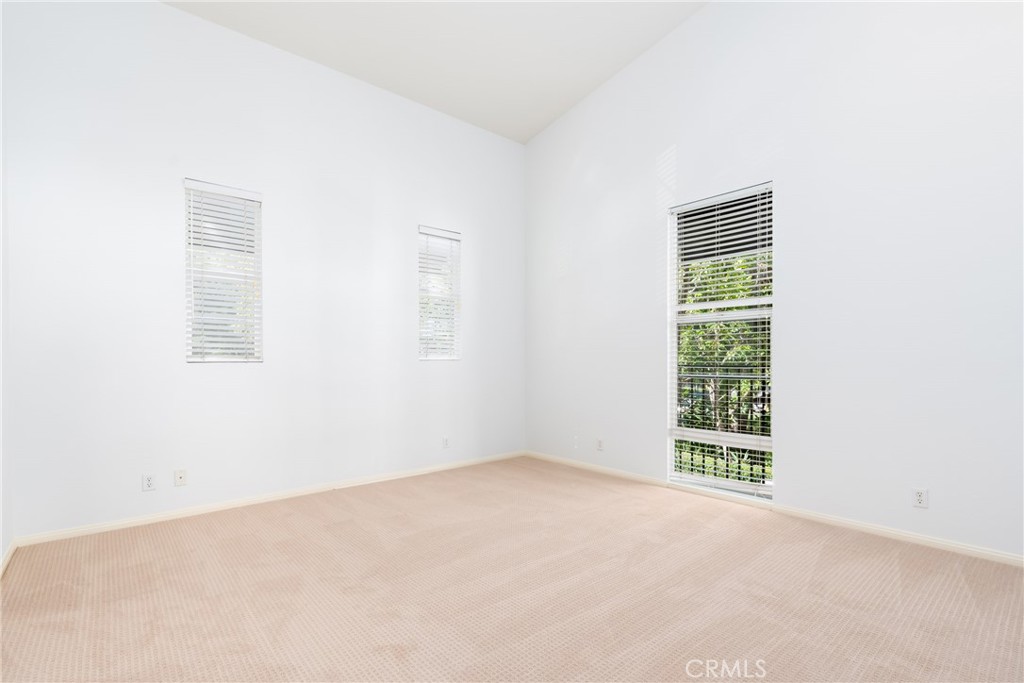 63 Nightshade Irvine, CA 92603 - Photo 8 of 15 an empty room with windows