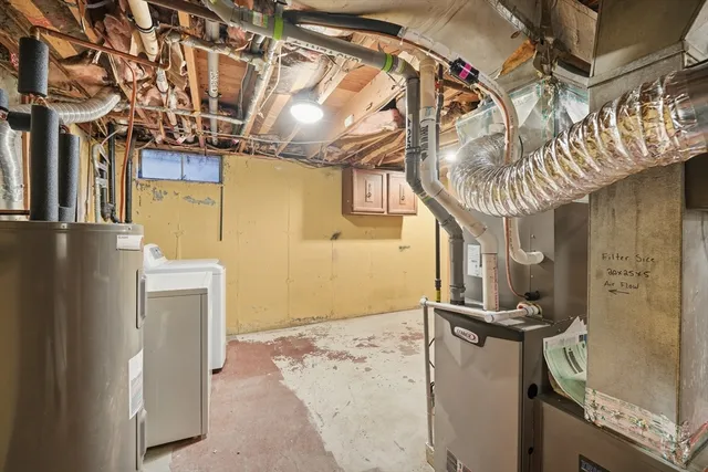 a bathroom with a tub and a shower