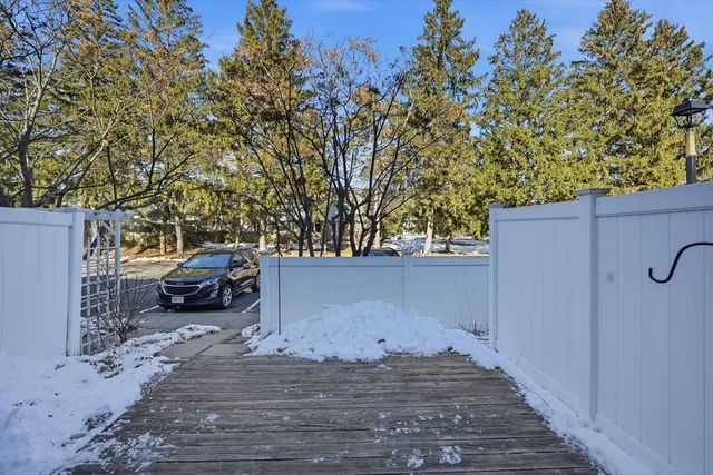 a view of a house with a tree