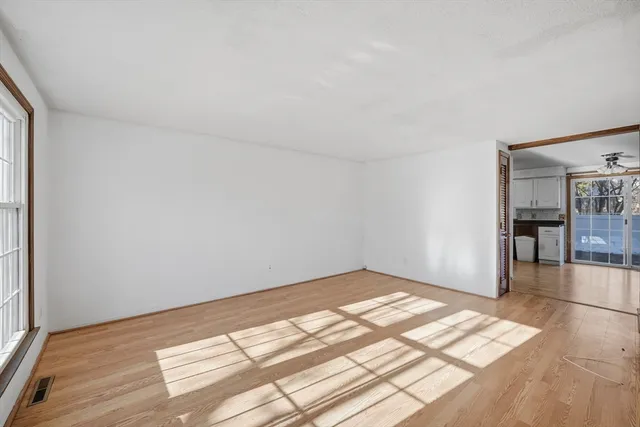 a view of an empty room and window