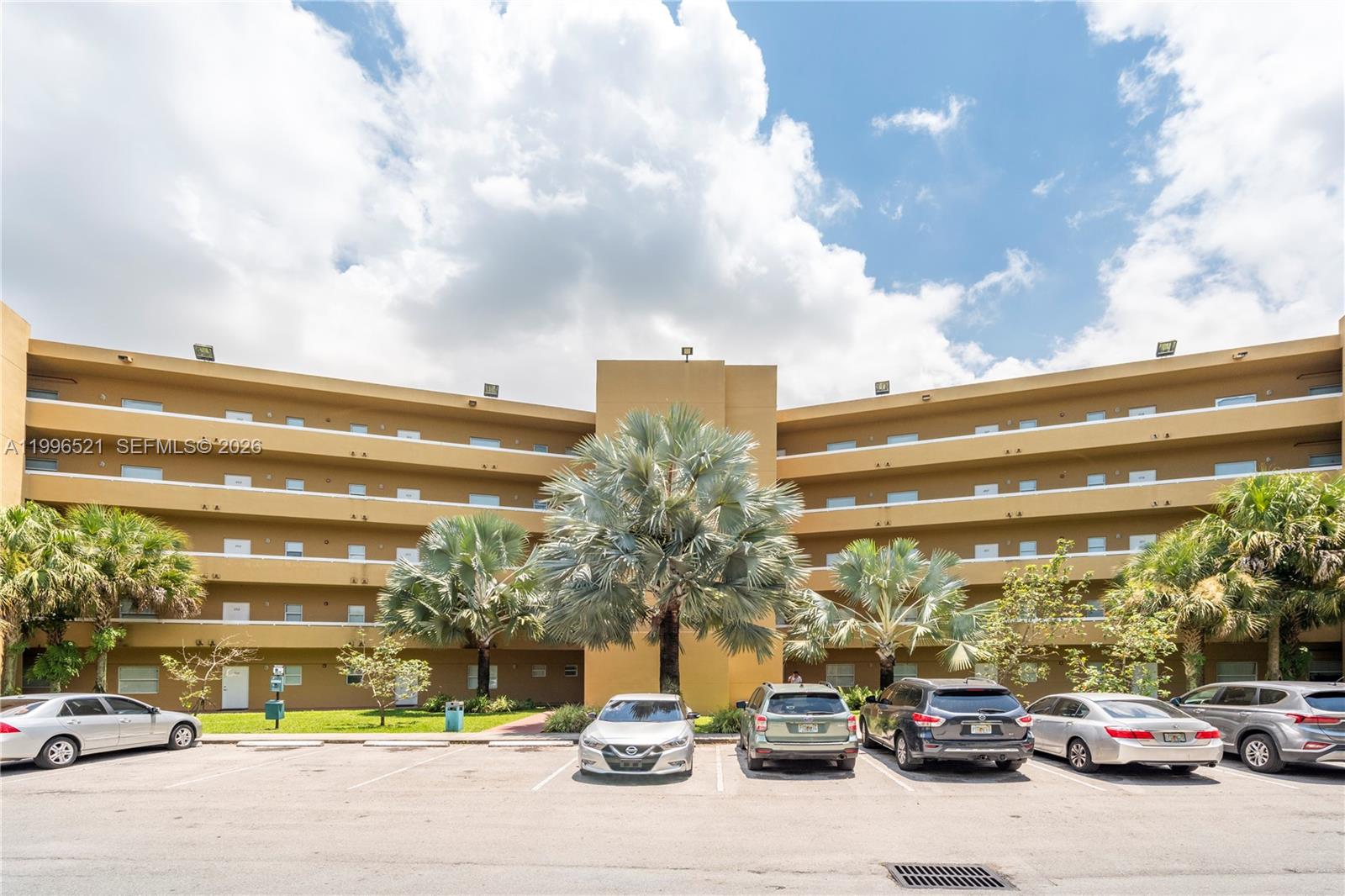 4137 Stirling Road, Unit 507 Dania Beach, FL 33314 - Photo 2 of 20 a car parked in front of a building