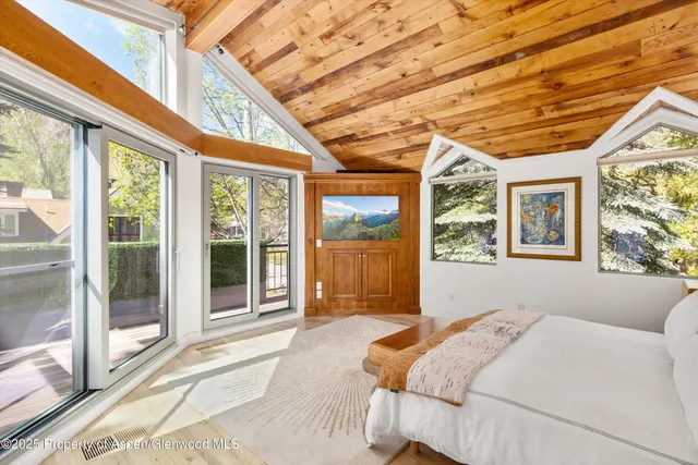 a view of a balcony a car parked on the floor