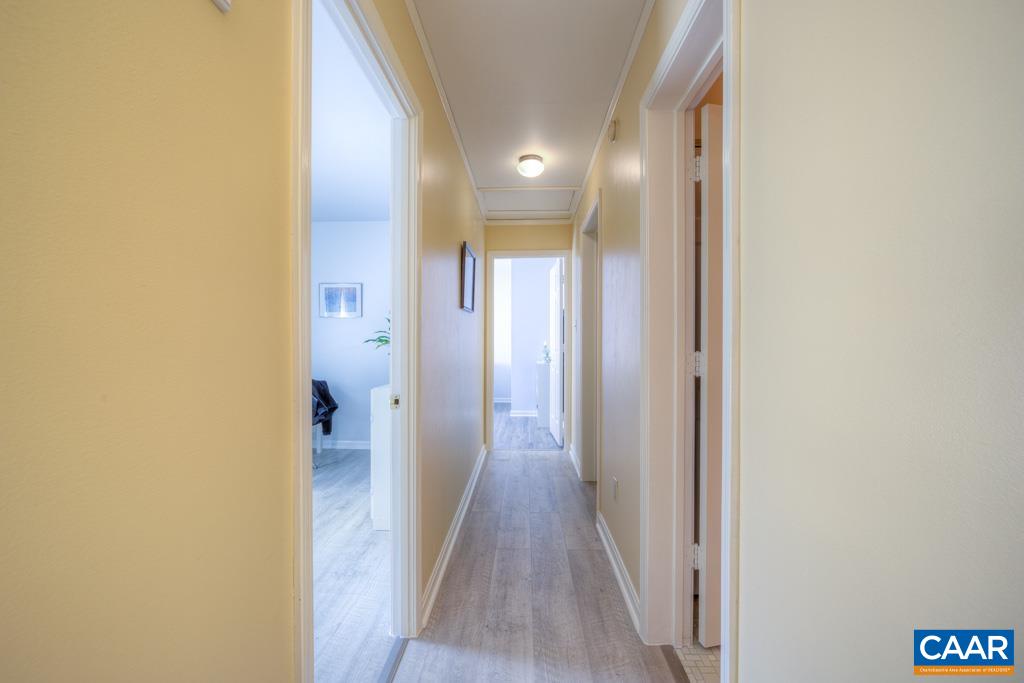 2475 Ridge Road Palmyra, VA 22963 - Photo 13 of 25 a view of a hallway with wooden floor