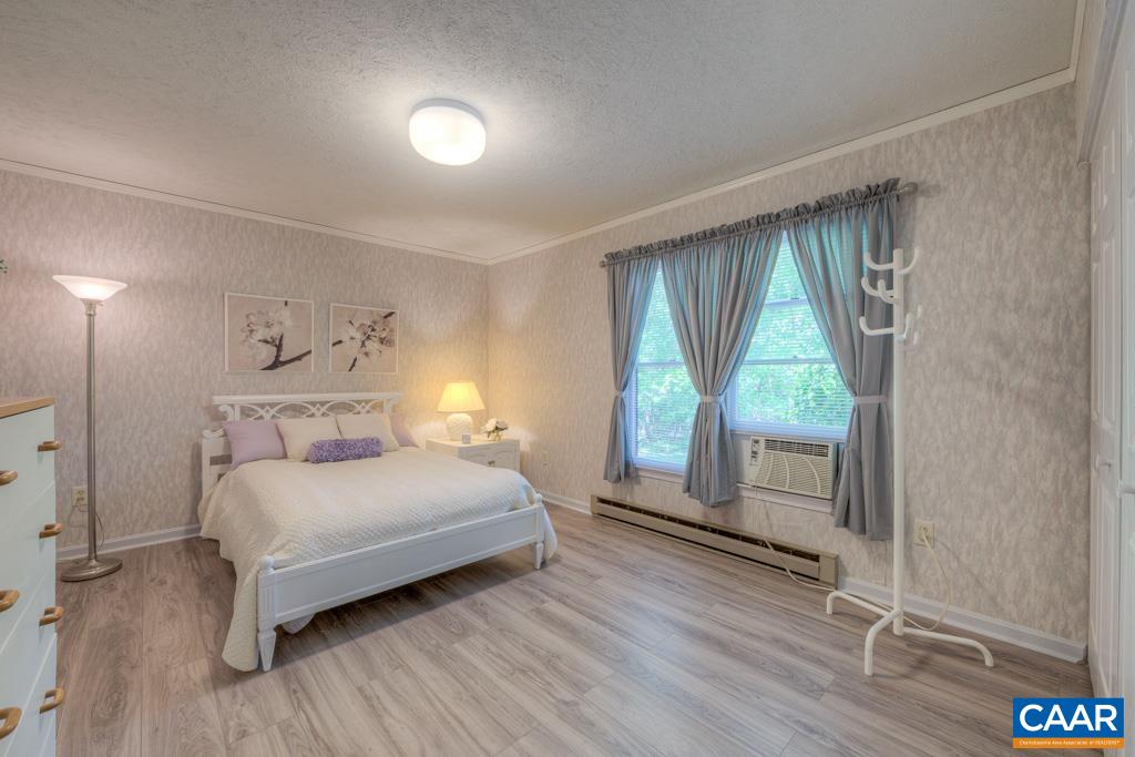 2475 Ridge Road Palmyra, VA 22963 - Photo 14 of 25 a bedroom with a bed and a large window