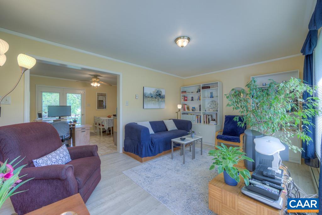 2475 Ridge Road Palmyra, VA 22963 - Photo 4 of 25 a living room with furniture and a potted plant