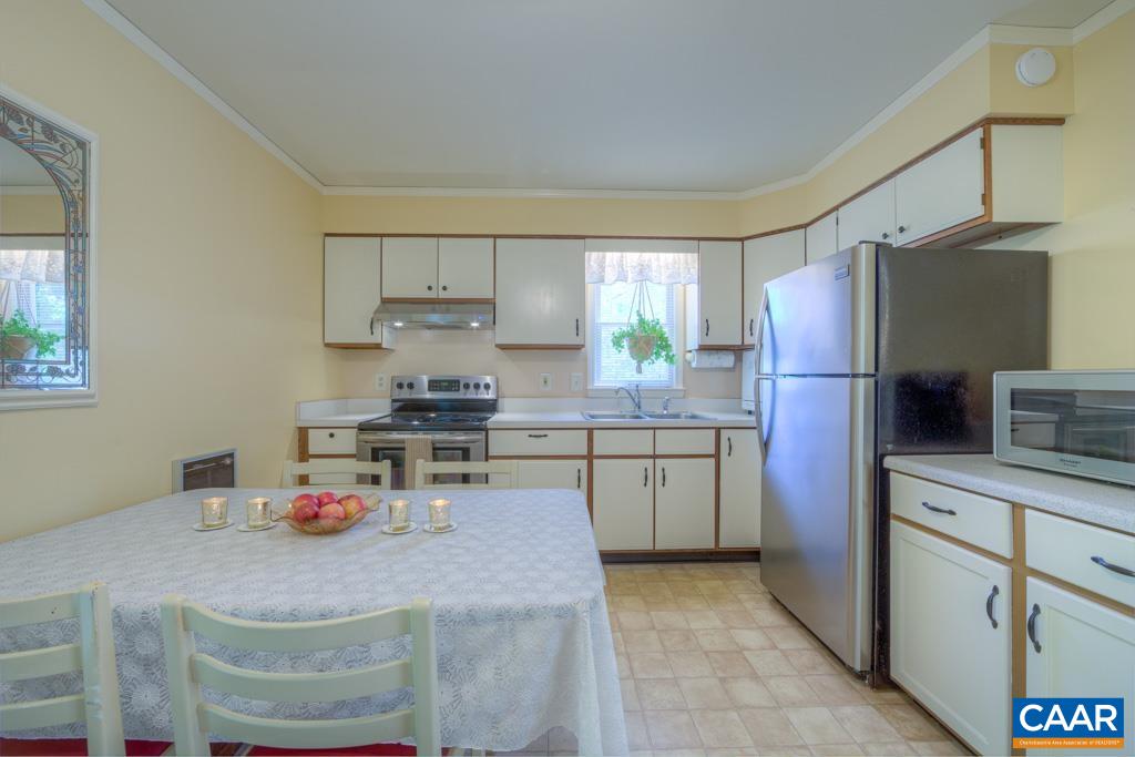 2475 Ridge Road Palmyra, VA 22963 - Photo 7 of 25 a kitchen with a sink appliances and cabinets