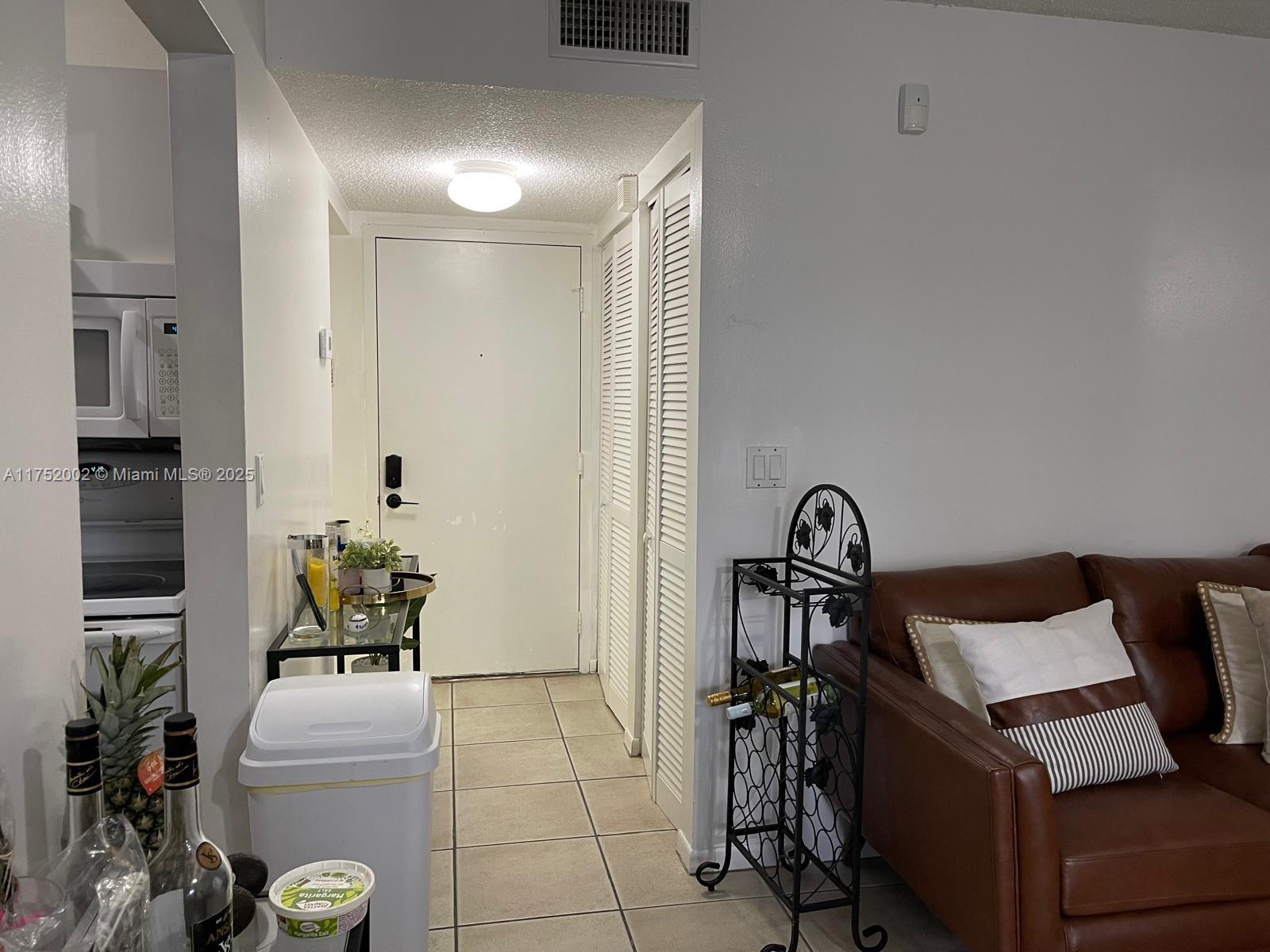 21133 Southwest 85th Avenue, Unit 112 Cutler Bay, FL 33189 - Photo 4 of 18 a workspace with furniture