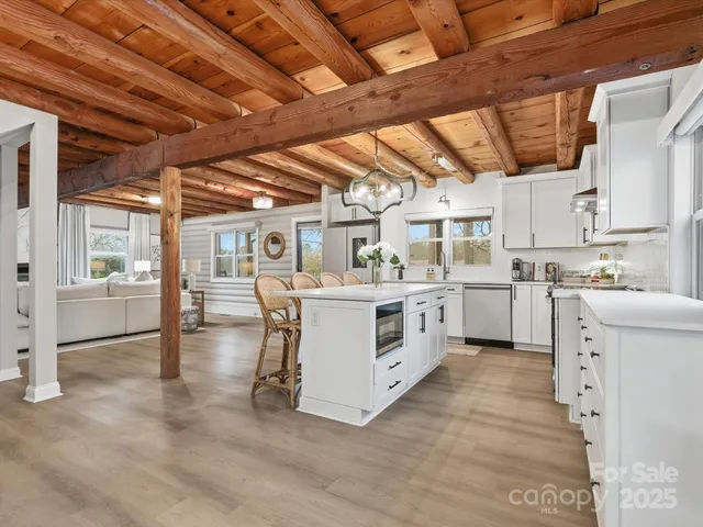 a kitchen with appliances cabinets and a sink